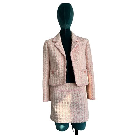 pale pink chanel|Chanel pink tweed suit.